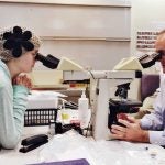 Kayla Funk with microscopes