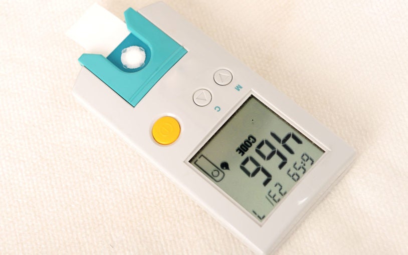 Diabetes patient measuring glucose level blood test