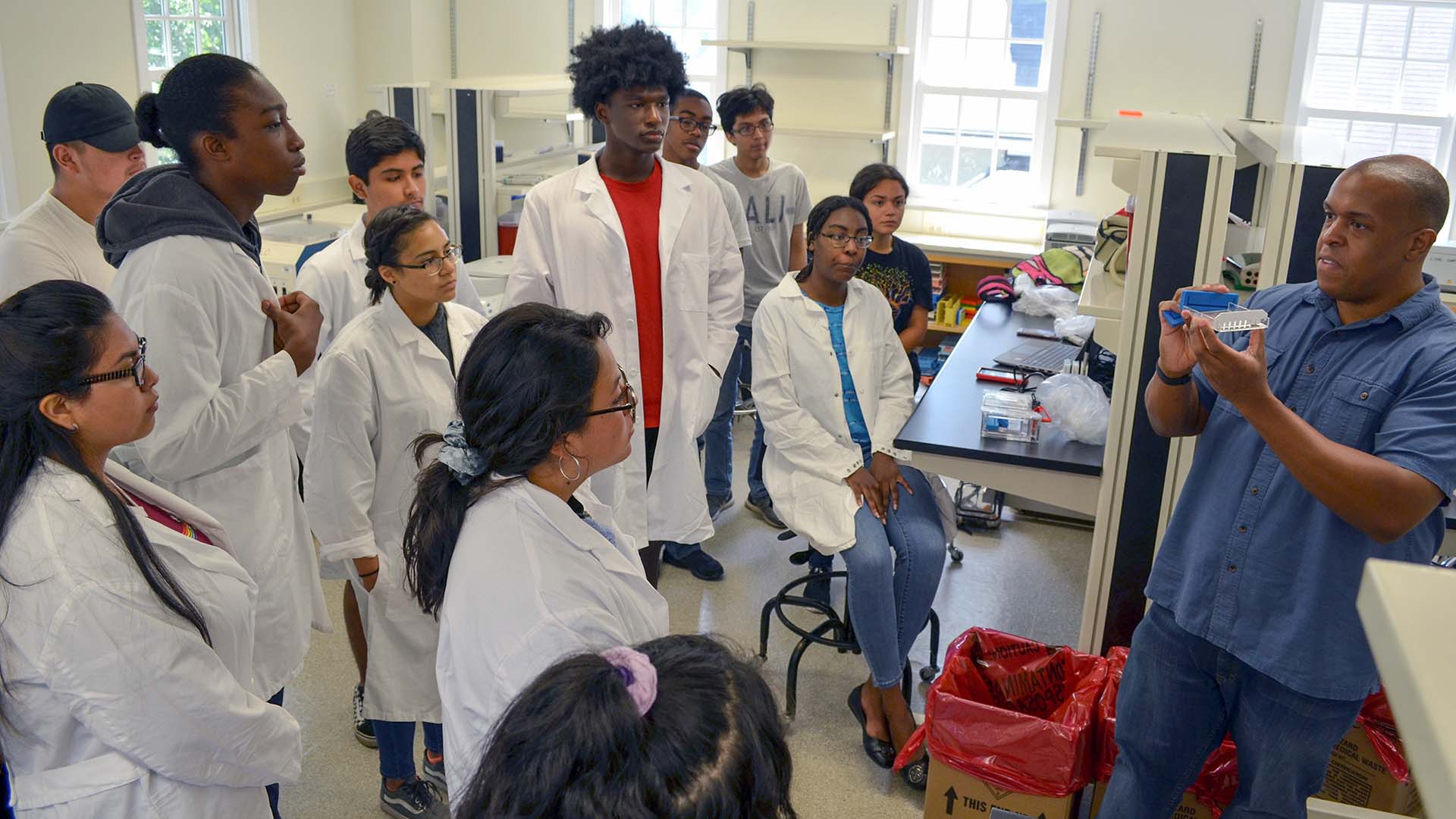 photo of minority students in STEM program lab.