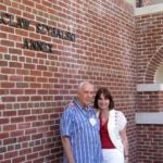 photo of Waclaw Szybalski and Mila Pollock outside the Szybalski Annex, 2010