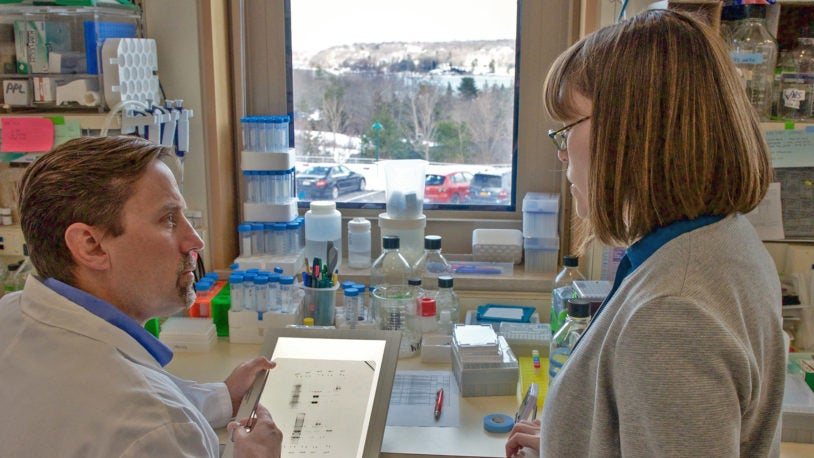 photo of David Tuveson and lab assistant