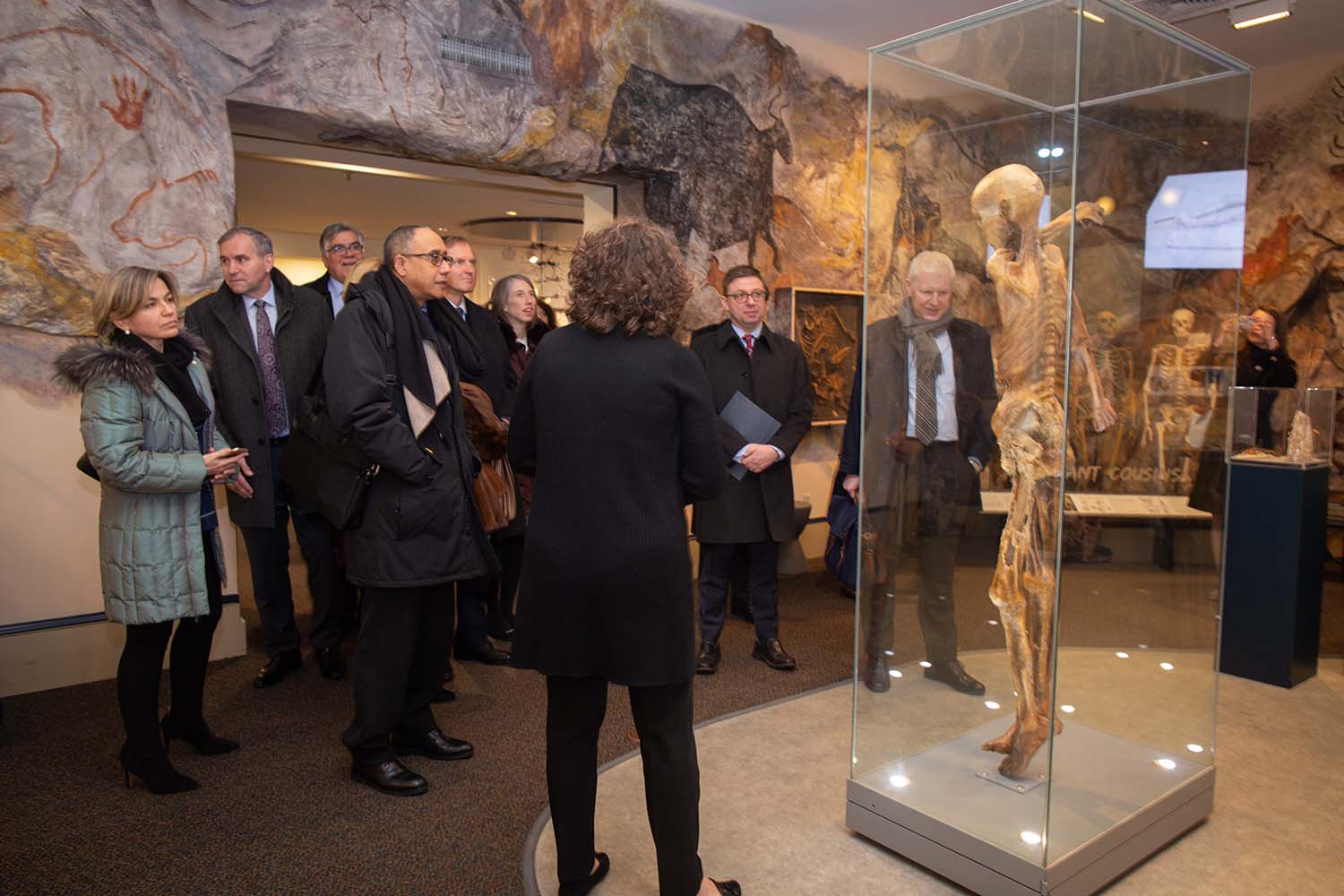 photo of UN delegates with Ötzi the Iceman exhibit