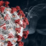 graphic of coronavirus and cigarette smoke
