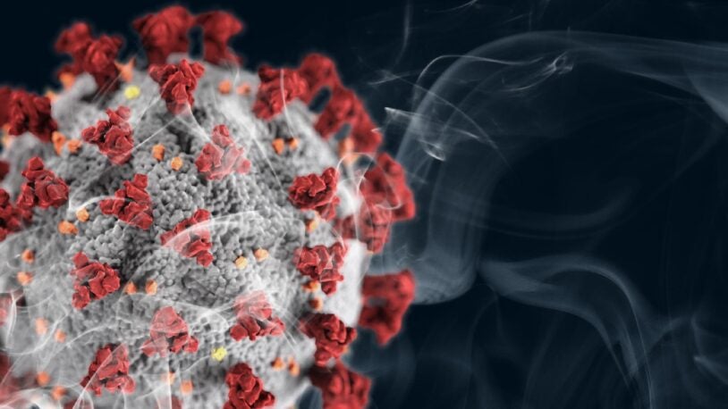graphic of coronavirus and cigarette smoke
