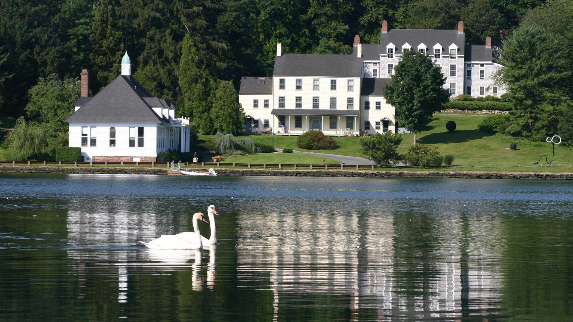 photo of CSHL campus from across the harbor