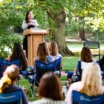 photo of Molly Hammell speaking at the 2020 Womens Partnership luncheon