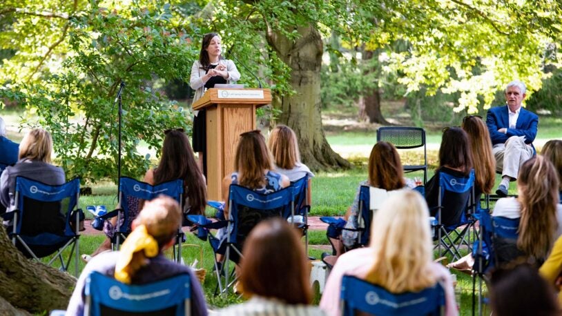 photo of Molly Hammell speaking at the 2020 Womens Partnership luncheon