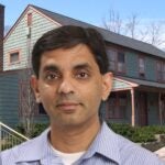 photo of Mukund Padmanabhan in front of Urey Cottage