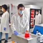 photo of Dennis Plenker working at the organoid facility