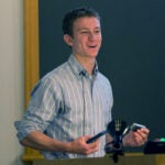 photo of Aspyn Palatnick_holding nanopore and iPhone