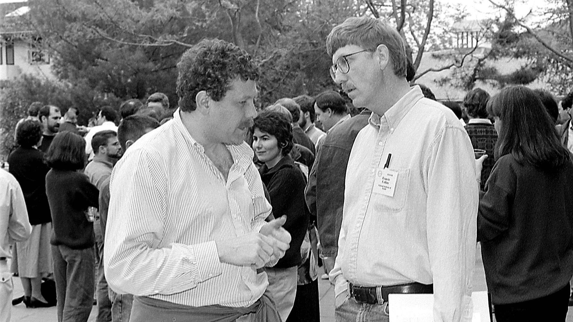 photo of Eric Lander and Francis Collins at a meeting at CSHL 1988