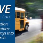 image of school bus passing Cold Spring Harbor Laboratory sign
