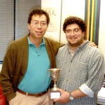 photo of Bob Tjian with Tiernan Cup in California