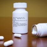photo of medicine bottles and pills