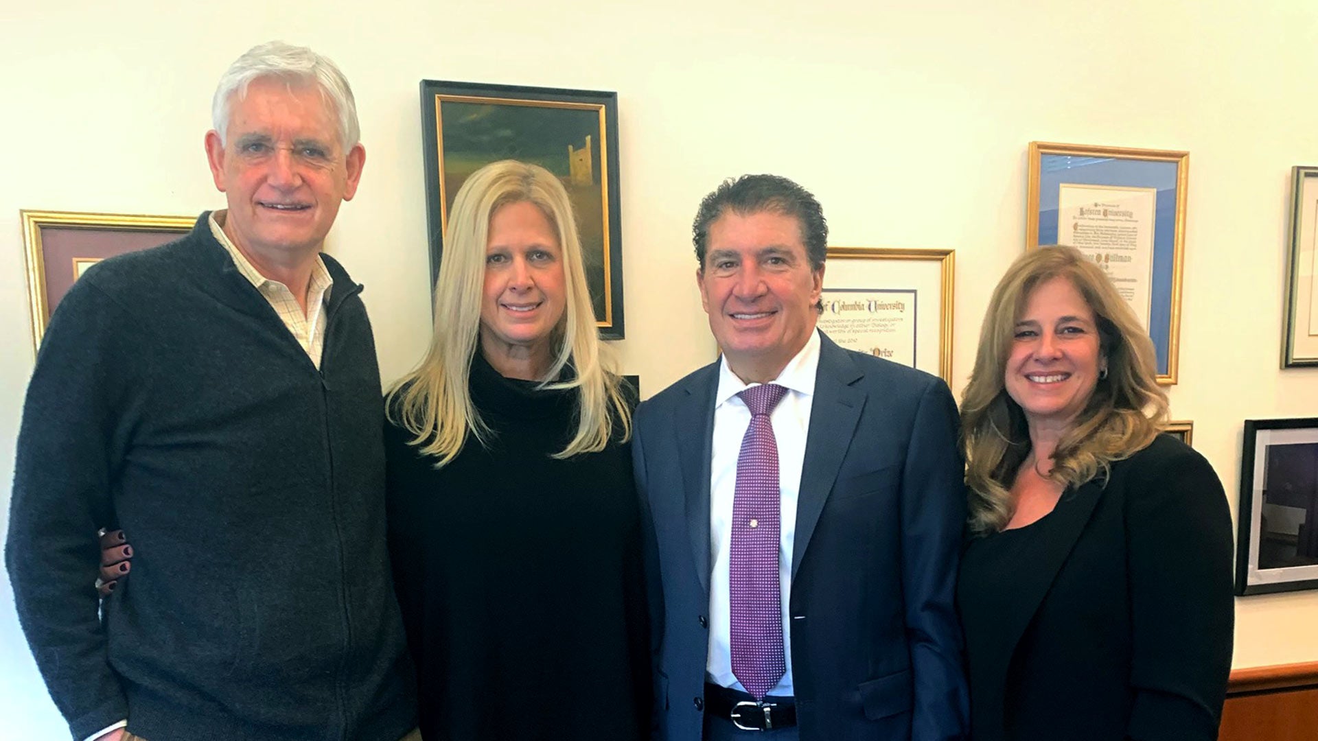 photo of Bruce Stillman with Anna Gevinski, Richard Monti, and Danielle Faria
