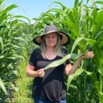 photo of Doreen Ware in a cornfield