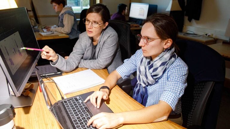 photo of Hannah Meyer at a computer