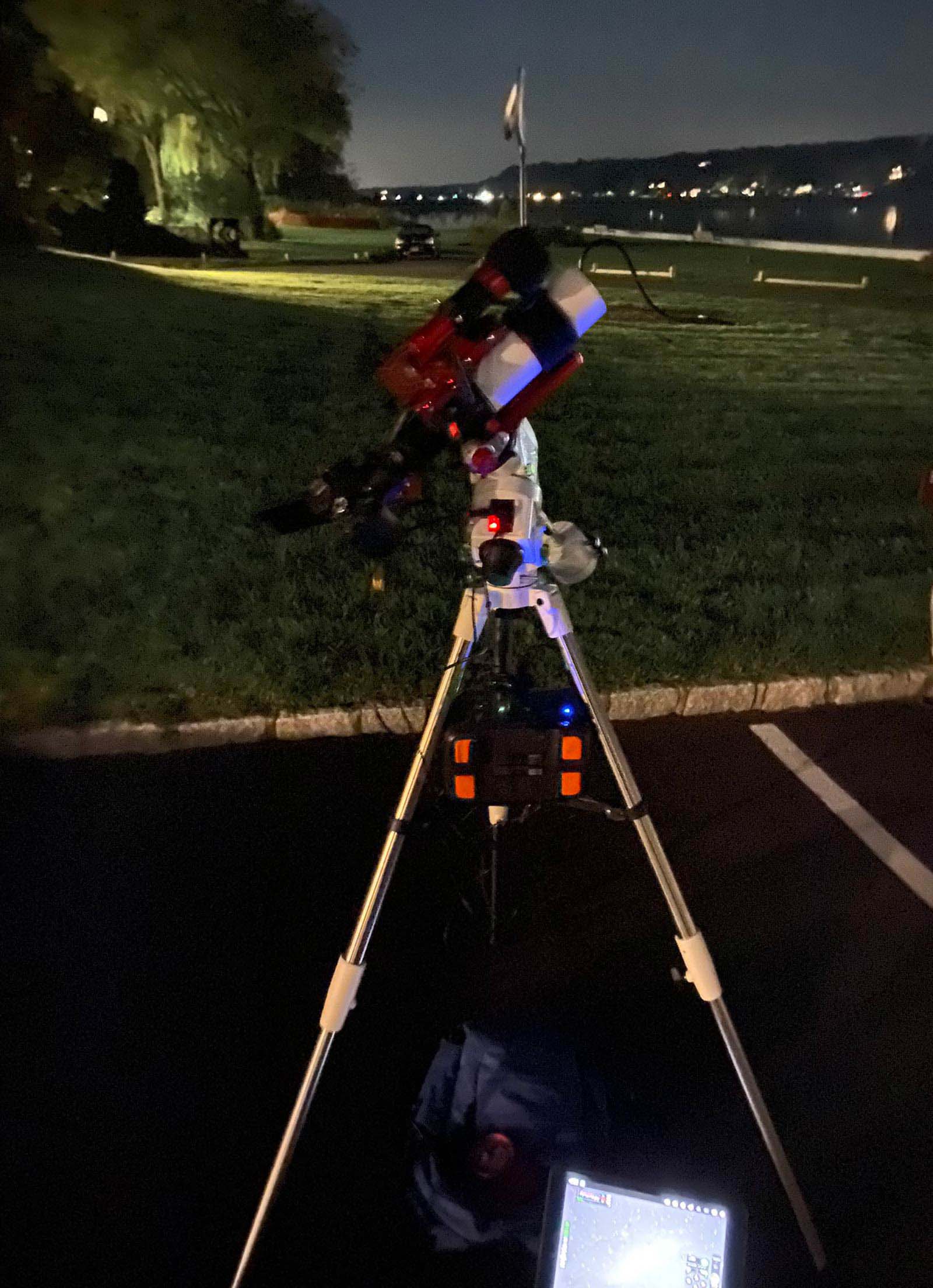 photo of a ZenithStar 61 APO refractor telescope in parking lot at CSHL