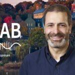image of Cold Spring Harbor campus from across the harbor with At the Lab podcast logo and portrait of Zach Lippman