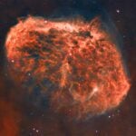 photo of brain-shaped Crescent Nebula