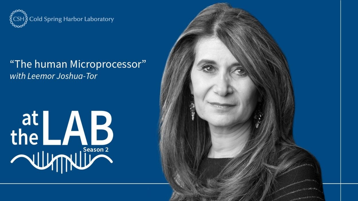image of the At the Lab podcast logo with black and white portrait of Leemor Joshua-Tor on a blue background