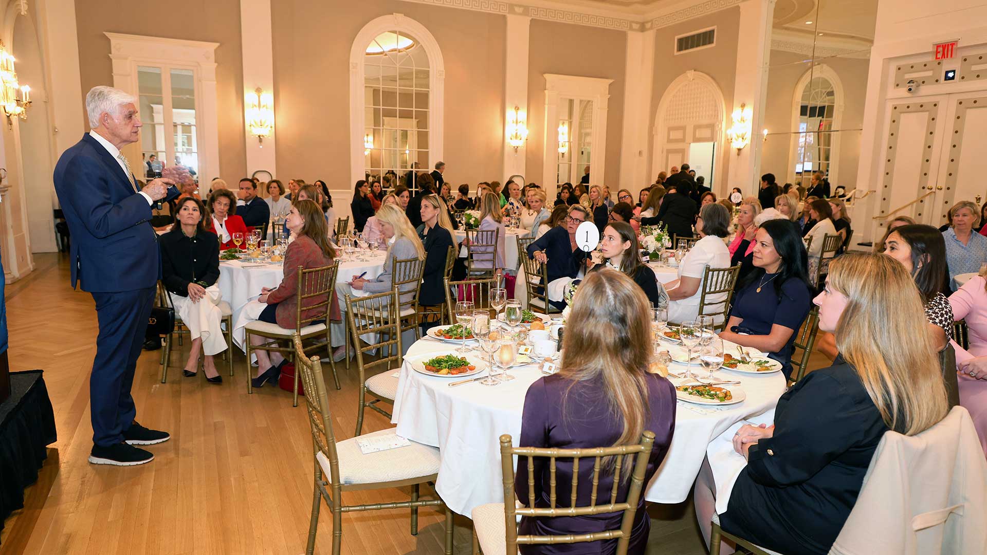 Image of Bruce Stillman addressing a crowd at the Cosmopolitan Club