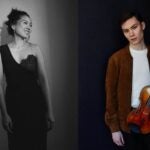 Chaeyoung Park in a dress stands smiling; Oliver Neubauer in a jacket holds a violin against a dark background.