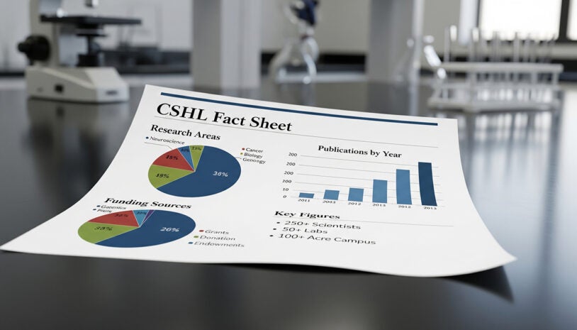 A fact sheet with charts, graphs, and key data lies on a laboratory table with lab equipment in the background.
