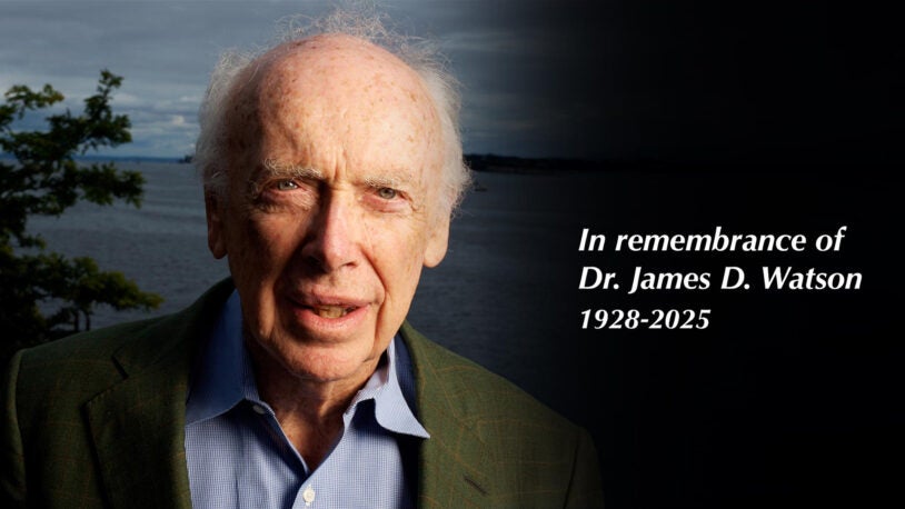 Elderly man outdoors with tribute text: In remembrance of Dr. James D. Watson 1928-2025.